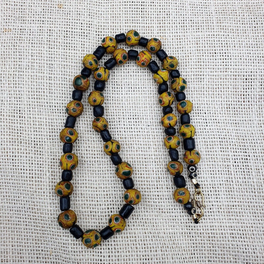 Gbr-2. vintage black yellow, green gabri eyes glass beads strand necklace.