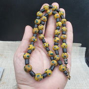 Gbr-2. vintage black yellow, green gabri eyes glass beads strand necklace.