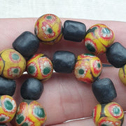 Vintage black yellow, green gabri eyes glass beads strand necklace.