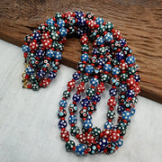 Venetian red whiteheart and venetian inspired multicolor skunk beads necklace