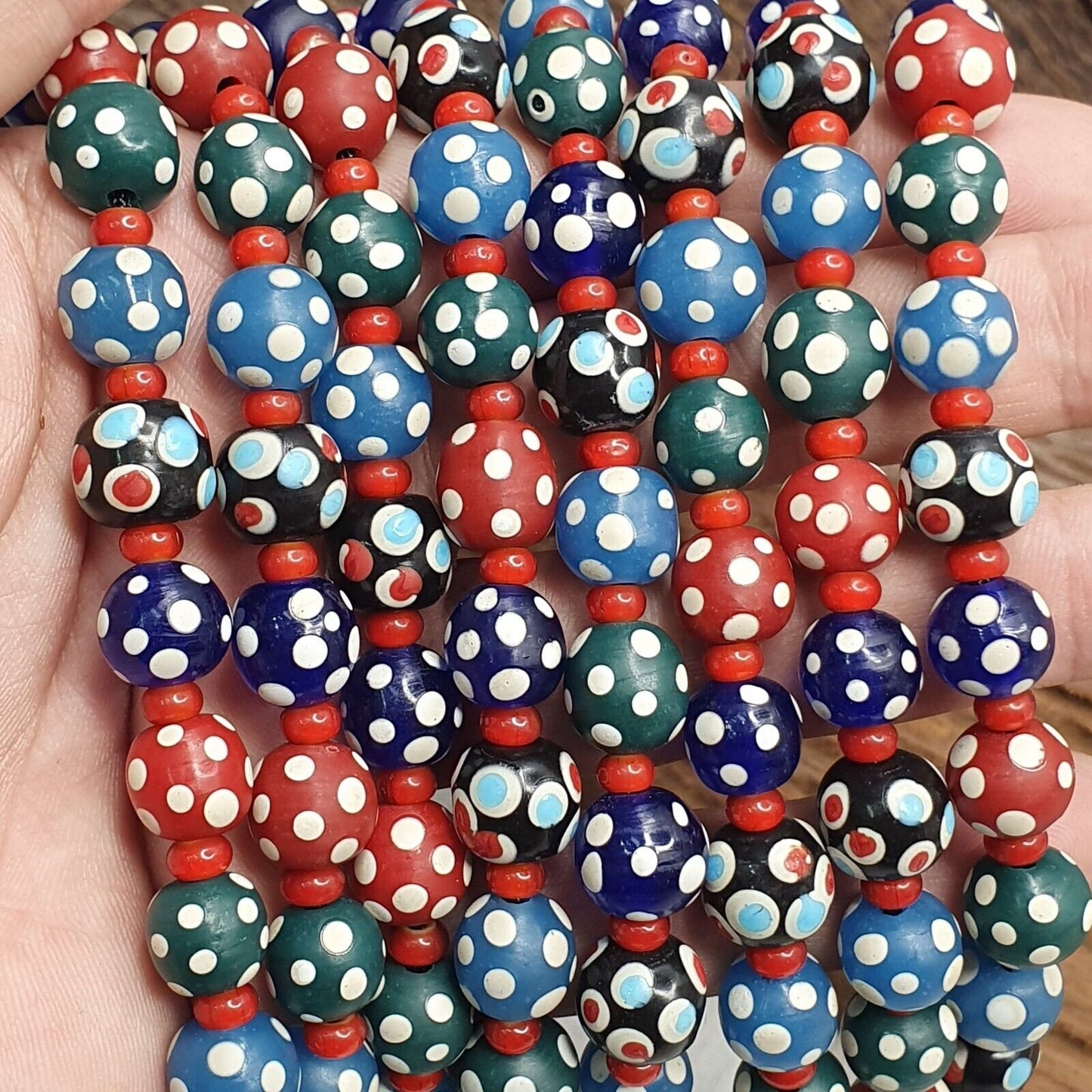 Venetian red whiteheart and venetian inspired multicolor skunk beads necklace