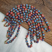 Venetian red whiteheart and venetian inspired multicolor skunk beads necklace