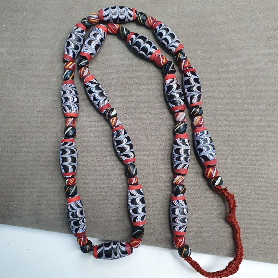 Venetian inspired millefiori black fancy feather glass beads.
