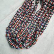 Vintage venetian style  african blue red glass chevron beads long strand.