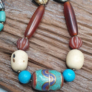 Vintage african beads chevron glass, pumtek, agate and nepal pendant necklace.