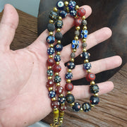 Vintage venetian style skunk and turkish evil eye beads necklace