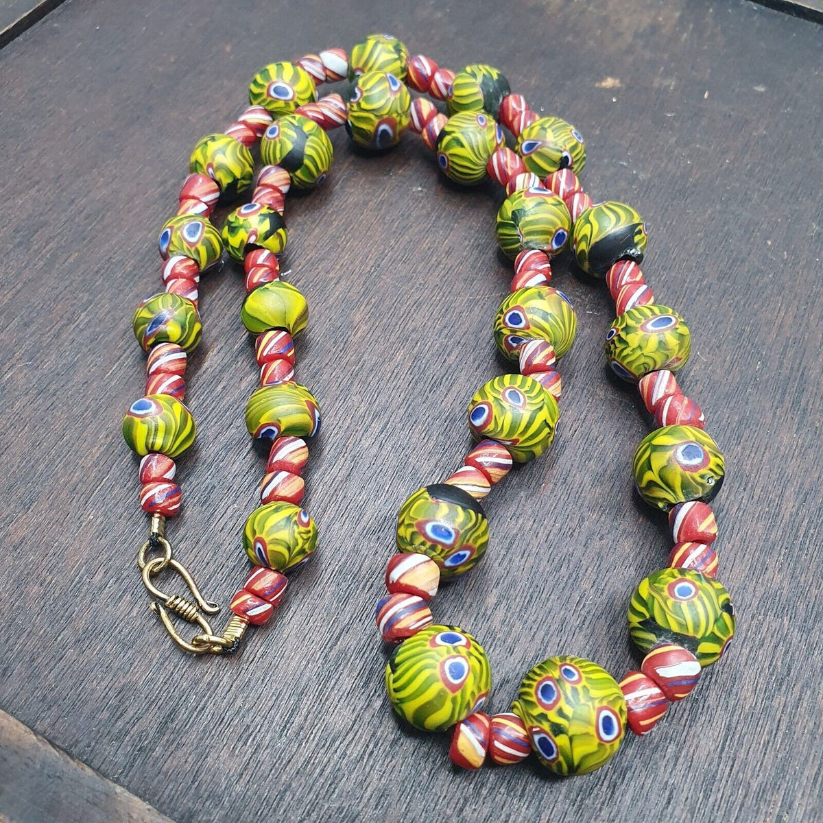 Vintage roman style green gabri eyes and african red glass beads necklace.