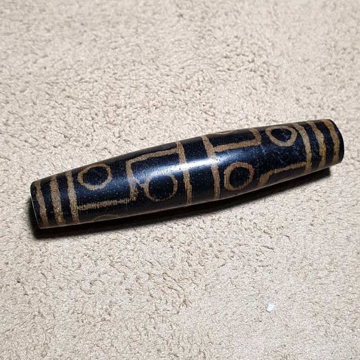 Eyes pattern antiquity trade pumtek petrified wood bead 57..4mm
