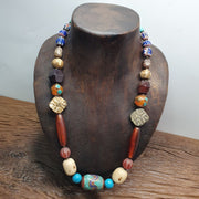 Vintage african beads chevron glass, pumtek, agate and nepal pendant necklace.