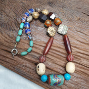 Vintage african beads chevron glass, pumtek, agate and nepal pendant necklace.