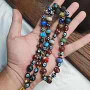 Vintage beads collection skunk, evil eye, blown glass beaded necklace.