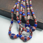 White heart with venetian style chevron, feather beads necklace.