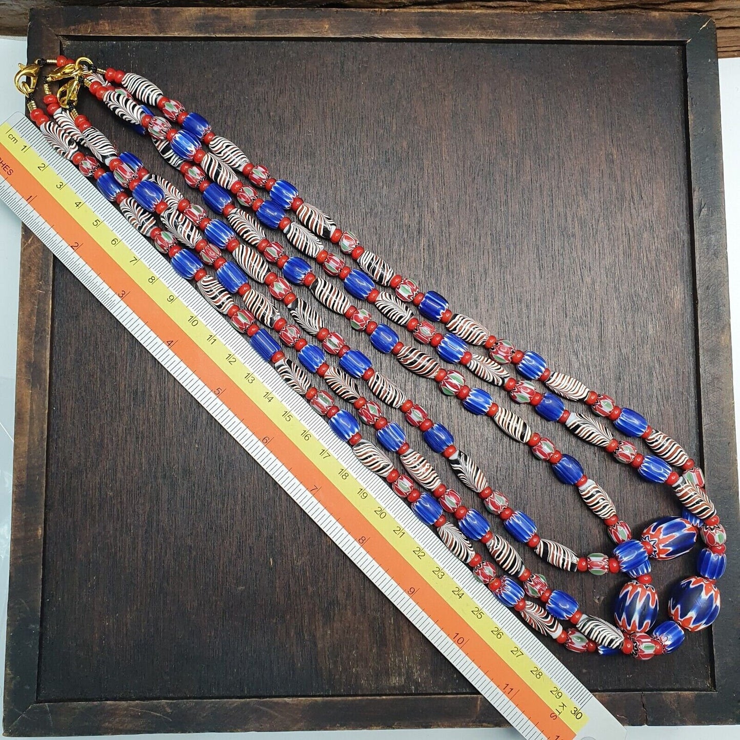 White heart with venetian style chevron, feather beads necklace.