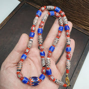 White heart with venetian style chevron, feather beads necklace.