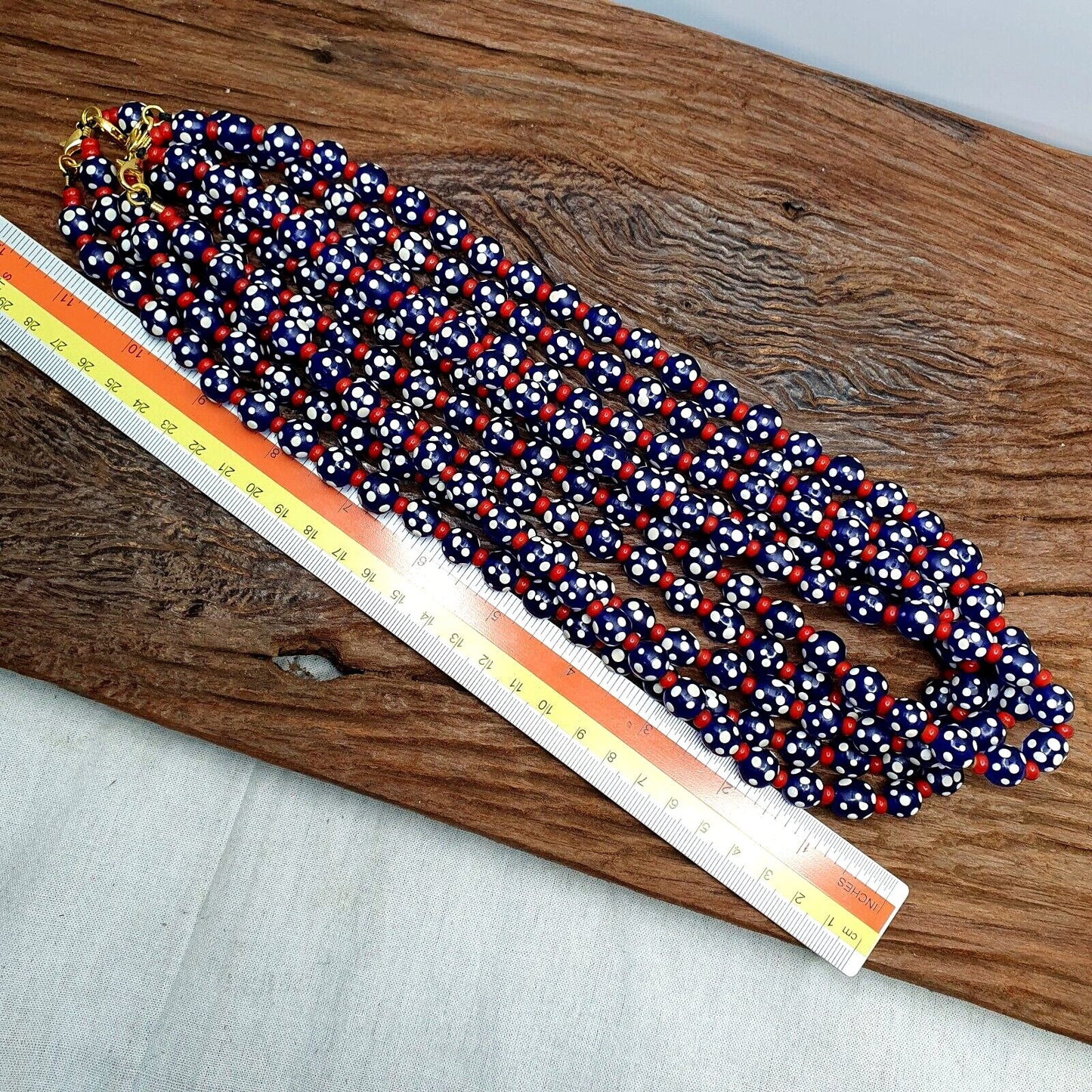Venetian red whiteheart and venetian inspired blue skunk glass beads necklace
