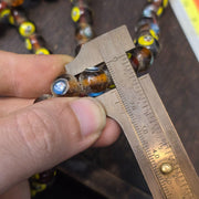 Brown tint small yellow smiley faces venetian inspired beads strand