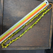 Greenish tint small yellow smiley faces venetian inspired beads strand
