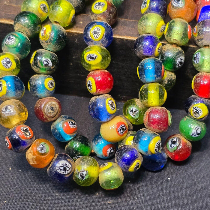 Vintage eye symbol embedded venetian inspired beads strand necklace