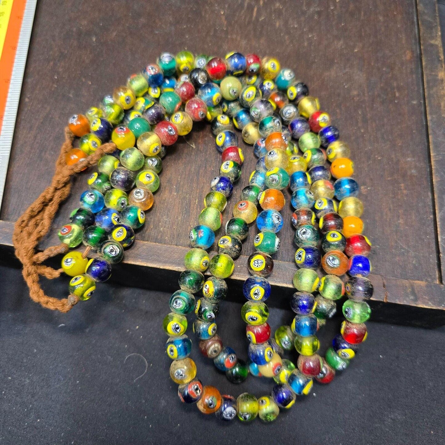 Vintage eye symbol embedded venetian inspired beads strand necklace