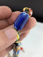 African style floral and chevron glass beads necklace.