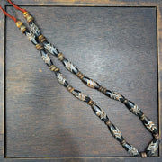 Vintage fancy feather venetian style glass and tibetan bone beads necklace.