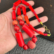 Antique african red glass antique beads necklace and 6mm whiteheart beads.