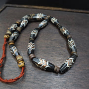Vintage fancy feather venetian style glass and tibetan bone beads necklace.