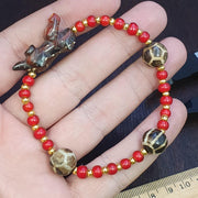 Antique Dzi Agate, Tibetan Carved Animal Bracelet | Multi-Hued Beads, Handcarved Figurines | Elastic Fit
