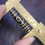 Dzi 2 eyes pattern asian burmese old pumtek petrified wood stone bead