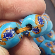Vintage venetian style millefiori beads - deep blue floral mosaic strand