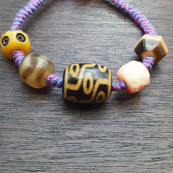 Handmade 9 eyes dzi bead bracelet multicolor cord - spiritual beads bracelet