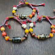 Handmade 2 eyes dzi bead bracelet multicolor cord - spiritual beads bracelet