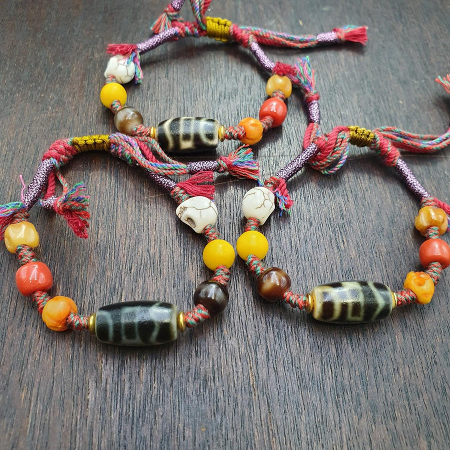 Handmade 2 eyes dzi bead bracelet multicolor cord - spiritual beads bracelet