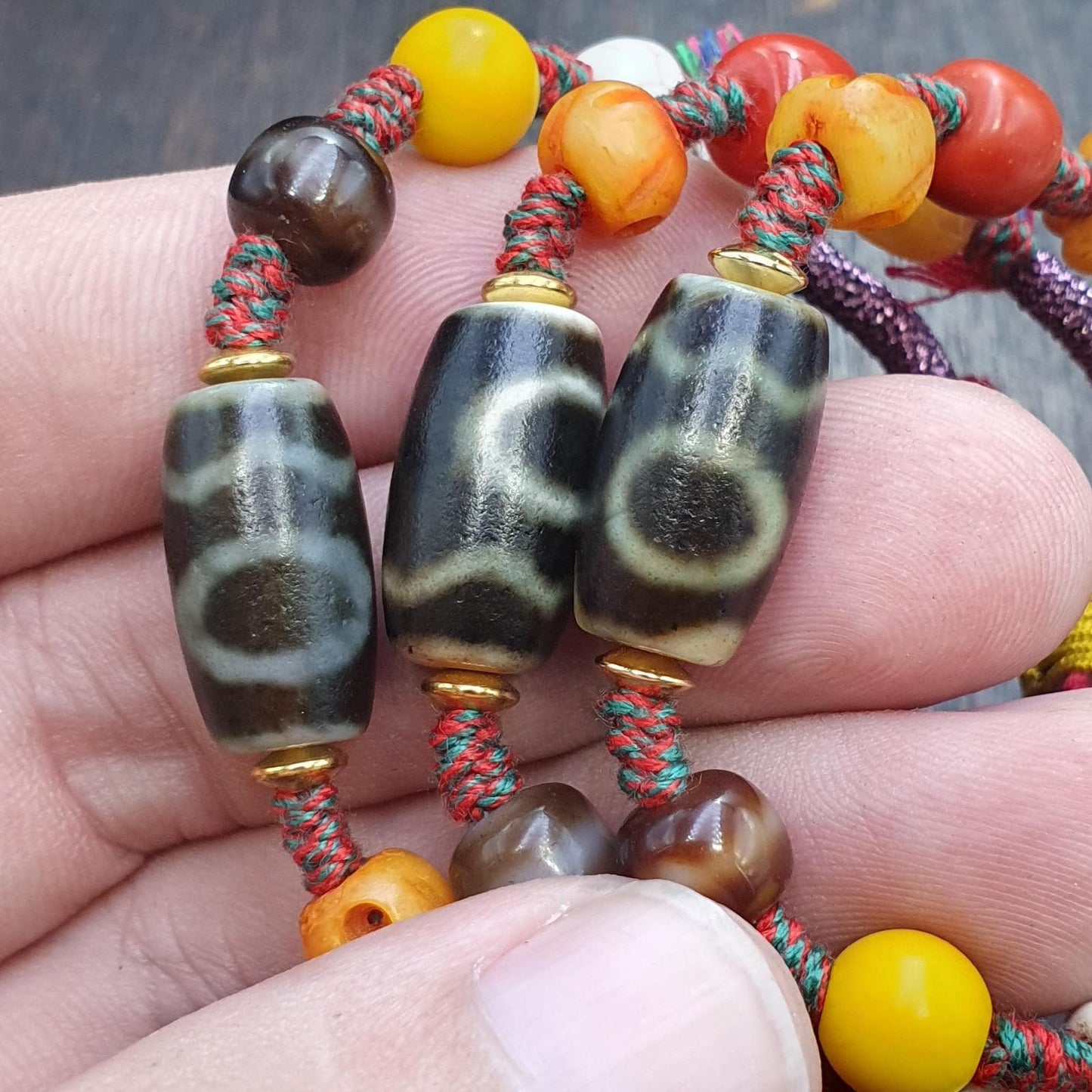 Handmade 2 eyes dzi bead bracelet multicolor cord - spiritual beads bracelet