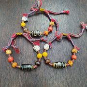 Handmade 2 eyes dzi bead bracelet multicolor cord - spiritual beads bracelet