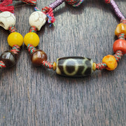 Handmade 2 eyes dzi bead bracelet multicolor cord - spiritual beads bracelet