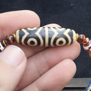 Tibetan nepalese 6 eyes agate dzi beads powerful fusion of spiritual symbolism