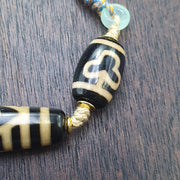 Tibetan 6 eye dzi agate bead necklace protective amulet with braided cord 2 dzi