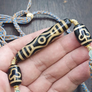 Tibetan 6 eye dzi agate bead necklace protective amulet with braided cord 2 dzi