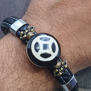 Wheel Motif Tibetan, Handcrafted Dzi Bracelet - Antique Agate Amulet, PU Leather Cord, Black Onyx Accents