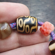 Handmade 9 eyes dzi bead bracelet multicolor cord - spiritual beads bracelet