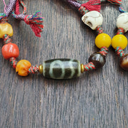 Handmade 2 eyes dzi bead bracelet multicolor cord - spiritual beads bracelet