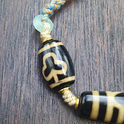 Tibetan 6 eye dzi agate bead necklace protective amulet with braided cord 2 dzi