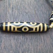 Tibetan 6 eye dzi agate bead necklace protective amulet with braided cord 2 dzi