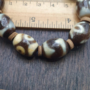 Tibetan dzi-style bead bracelet mala with eye and wave motifs – photo 5 of 5