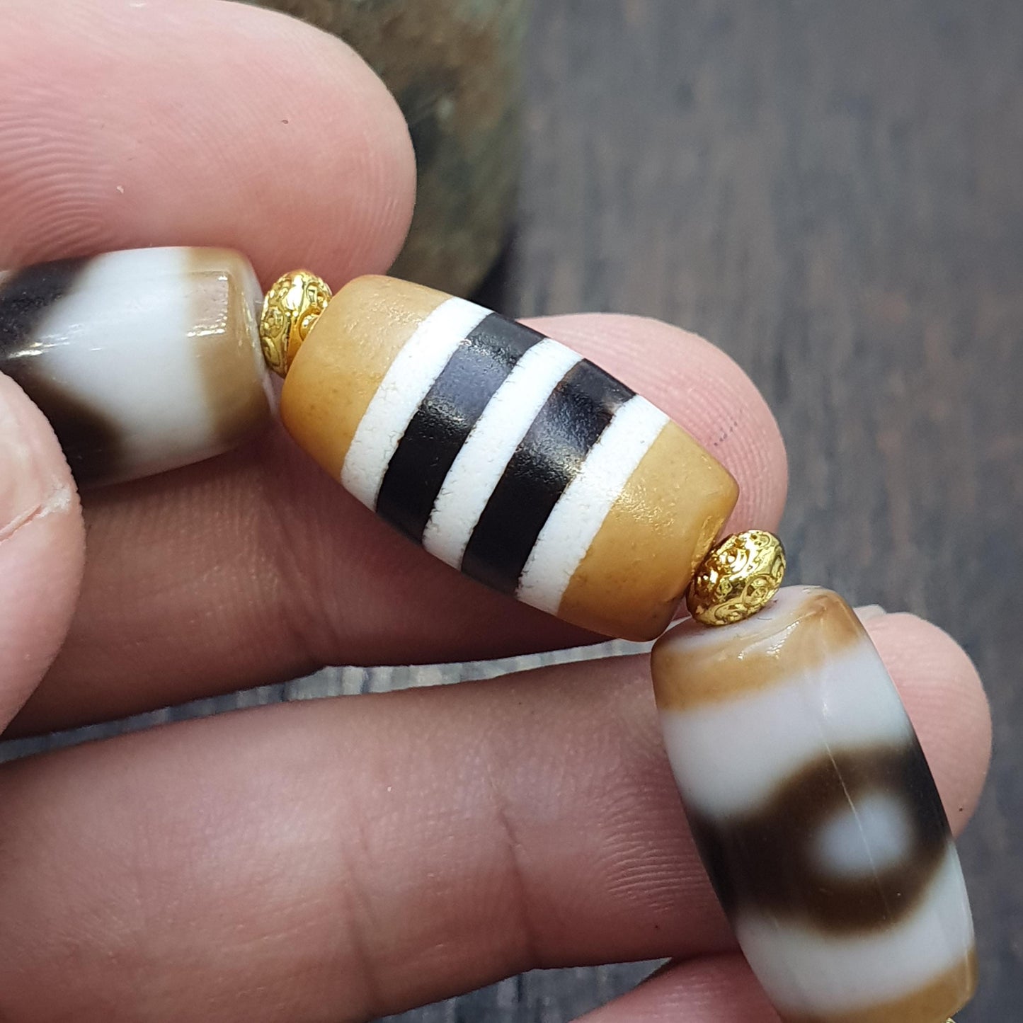 Tibetan nepalese dzi beads bracelet handmade cylindrical beads, gold spacers