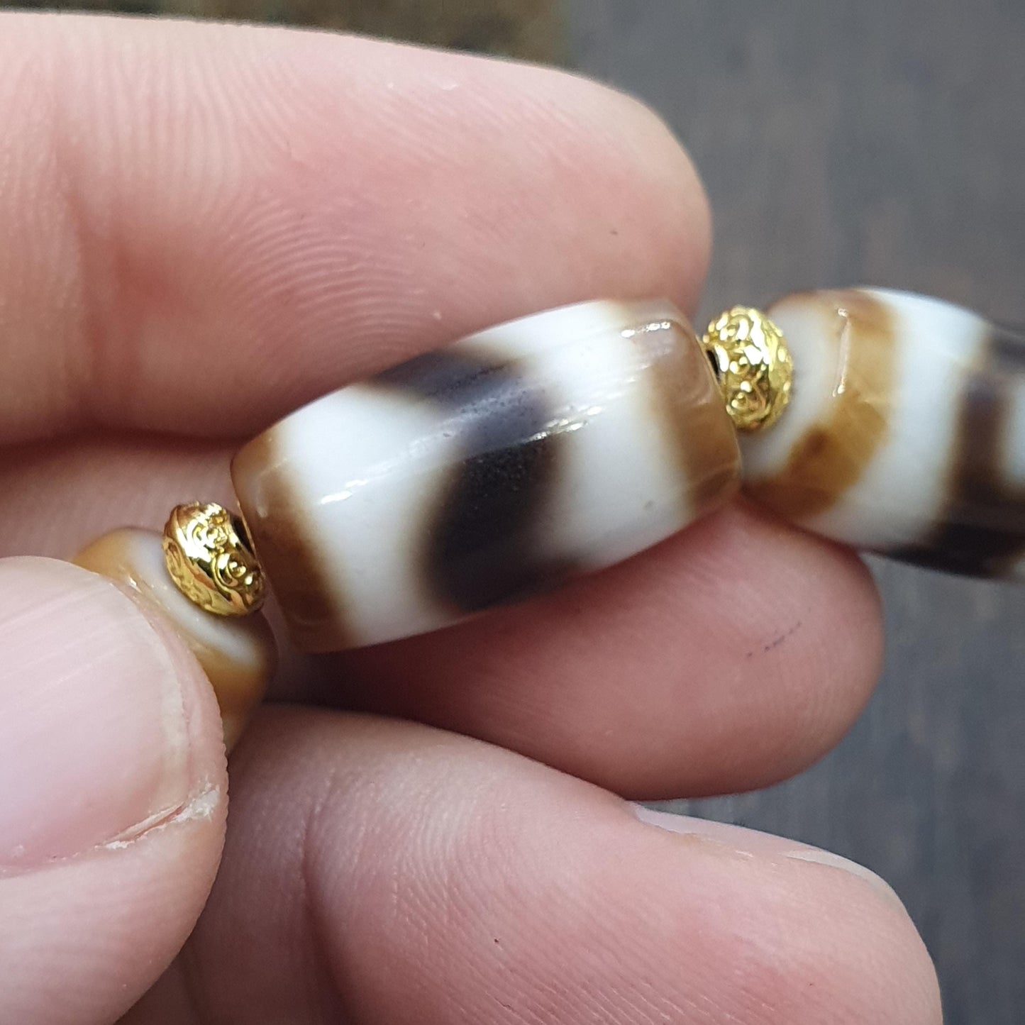 Tibetan nepalese dzi beads bracelet handmade cylindrical beads, gold spacers
