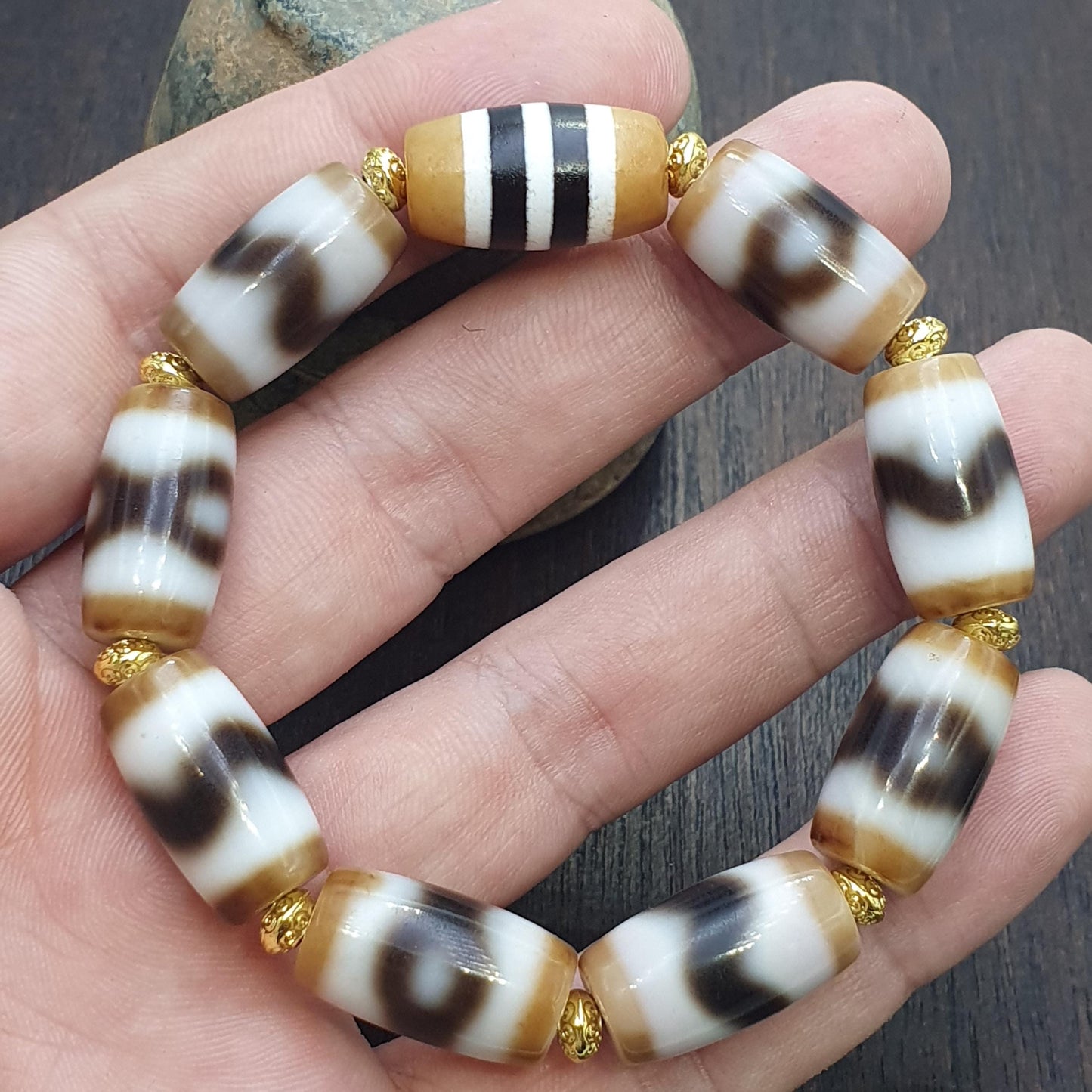 Tibetan nepalese dzi beads bracelet handmade cylindrical beads, gold spacers
