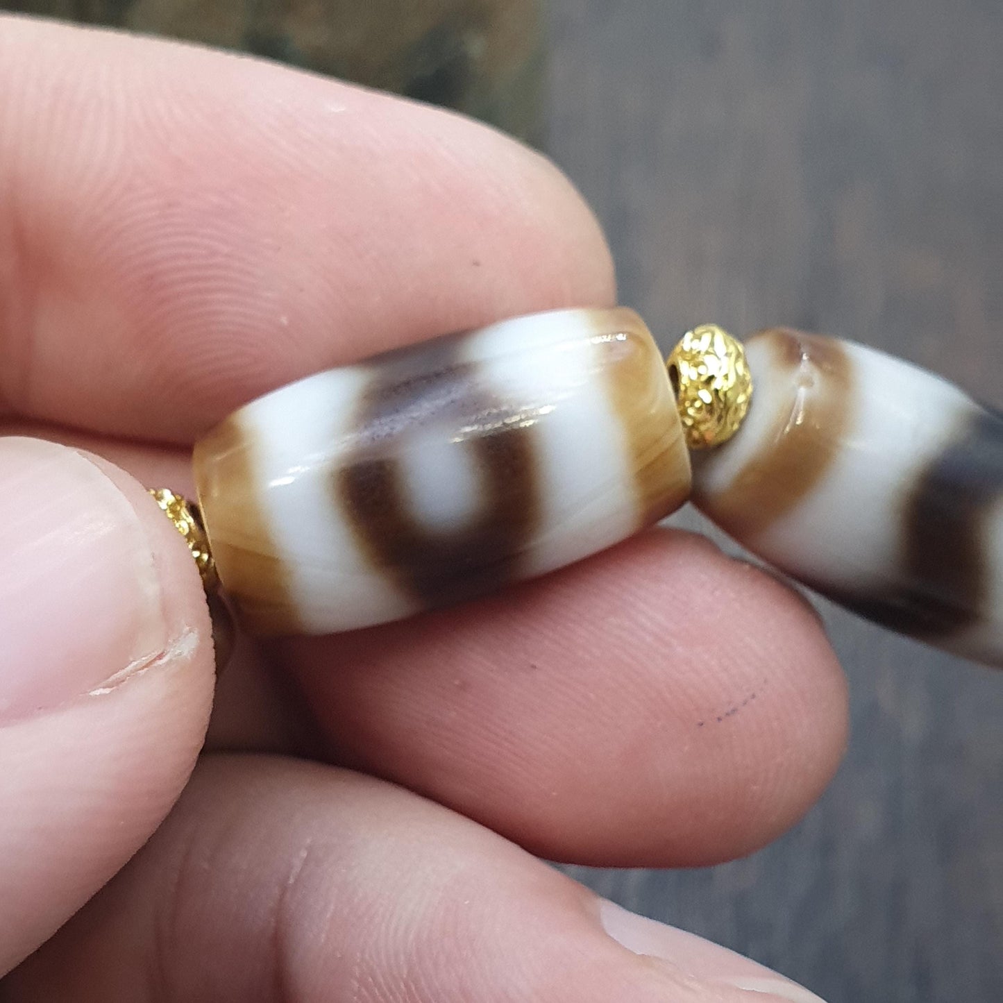 Tibetan nepalese dzi beads bracelet handmade cylindrical beads, gold spacers