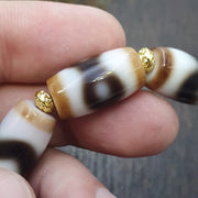 Tibetan nepalese dzi beads bracelet handmade cylindrical beads, gold spacers